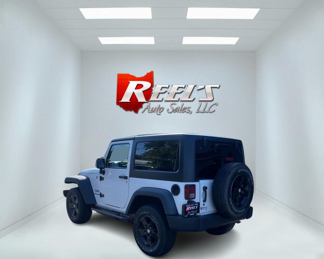 2013 White /Black Jeep Wrangler Sport 4WD (1C4AJWAG7DL) with an 3.6L V6 DOHC 24V engine, 6 Speed Manual transmission, located at 11115 Chardon Rd. , Chardon, OH, 44024, (440) 214-9705, 41.580246, -81.241943 - Photo#10